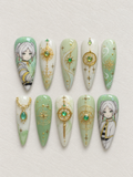 Frieren green gold fantasy press-on nails full set with anime character art and compass motifs