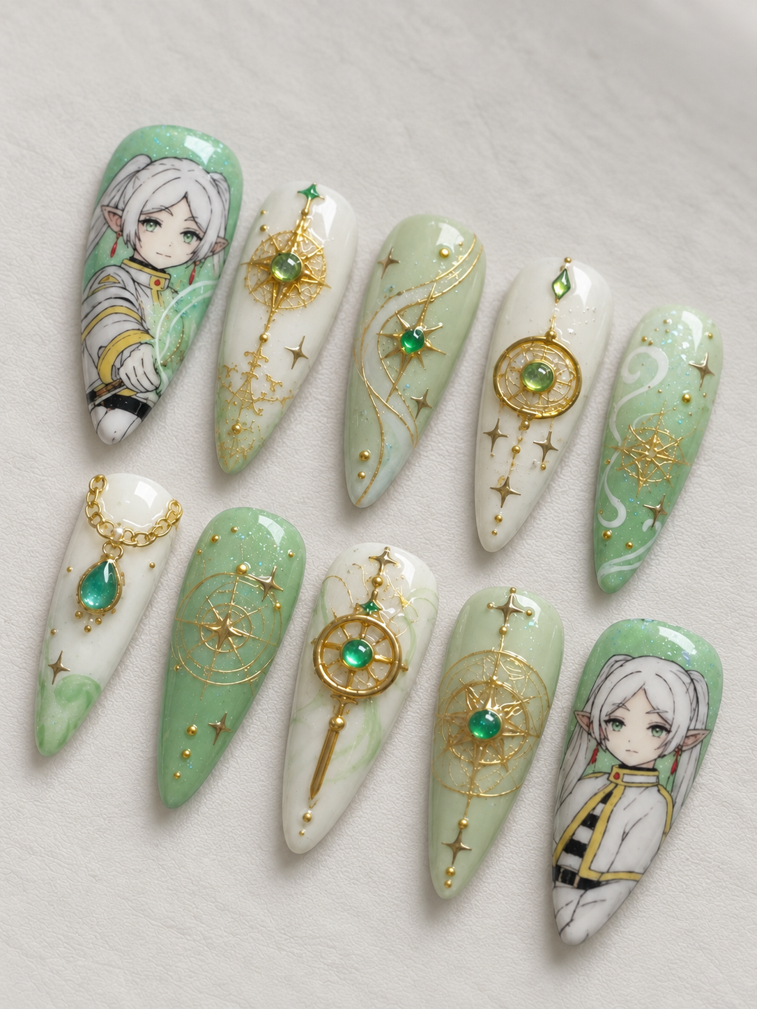 Frieren fantasy press-on nails set with gold charms, gemstones, and star details